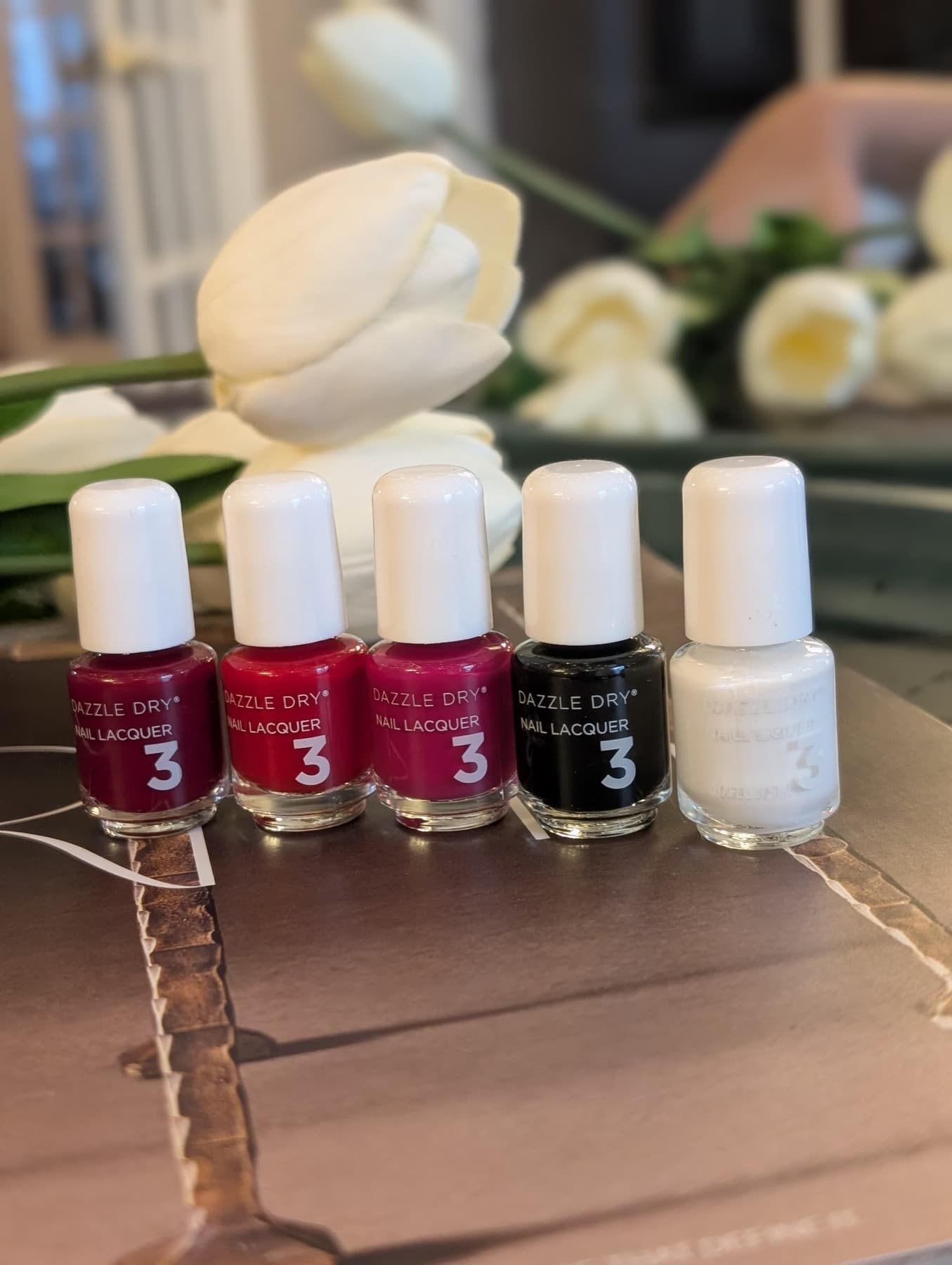 Dazzle Dry nail lacquer bottles at LNO Boutique in Centennial