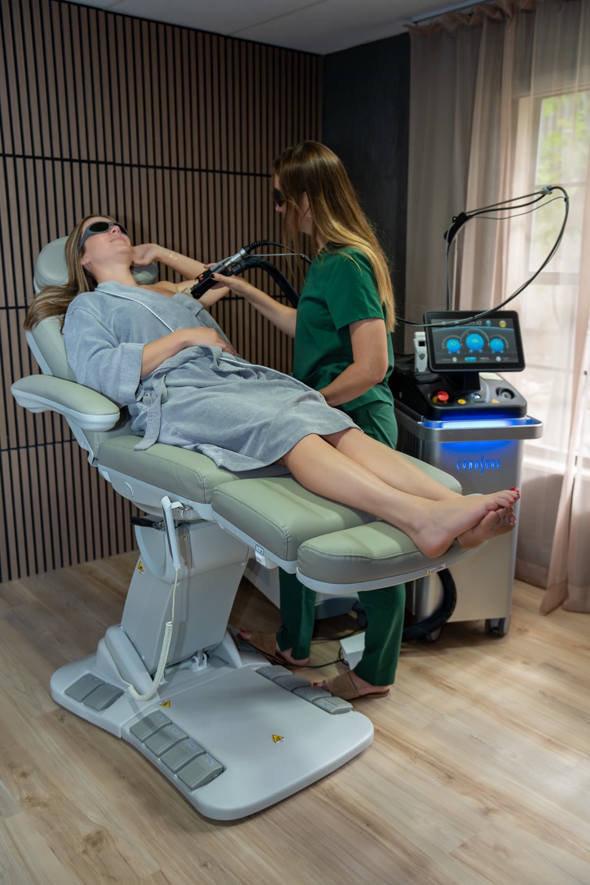 Underarm laser hair removal with the Cynosure Elite iQ in the private treatment room at LNO Boutique in Centennial, Denver