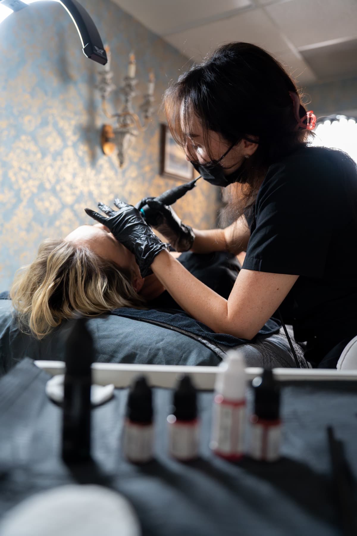 Permanent makeup powder brows being applied in the treatment room at LNO Boutique in Centennial, Colorado