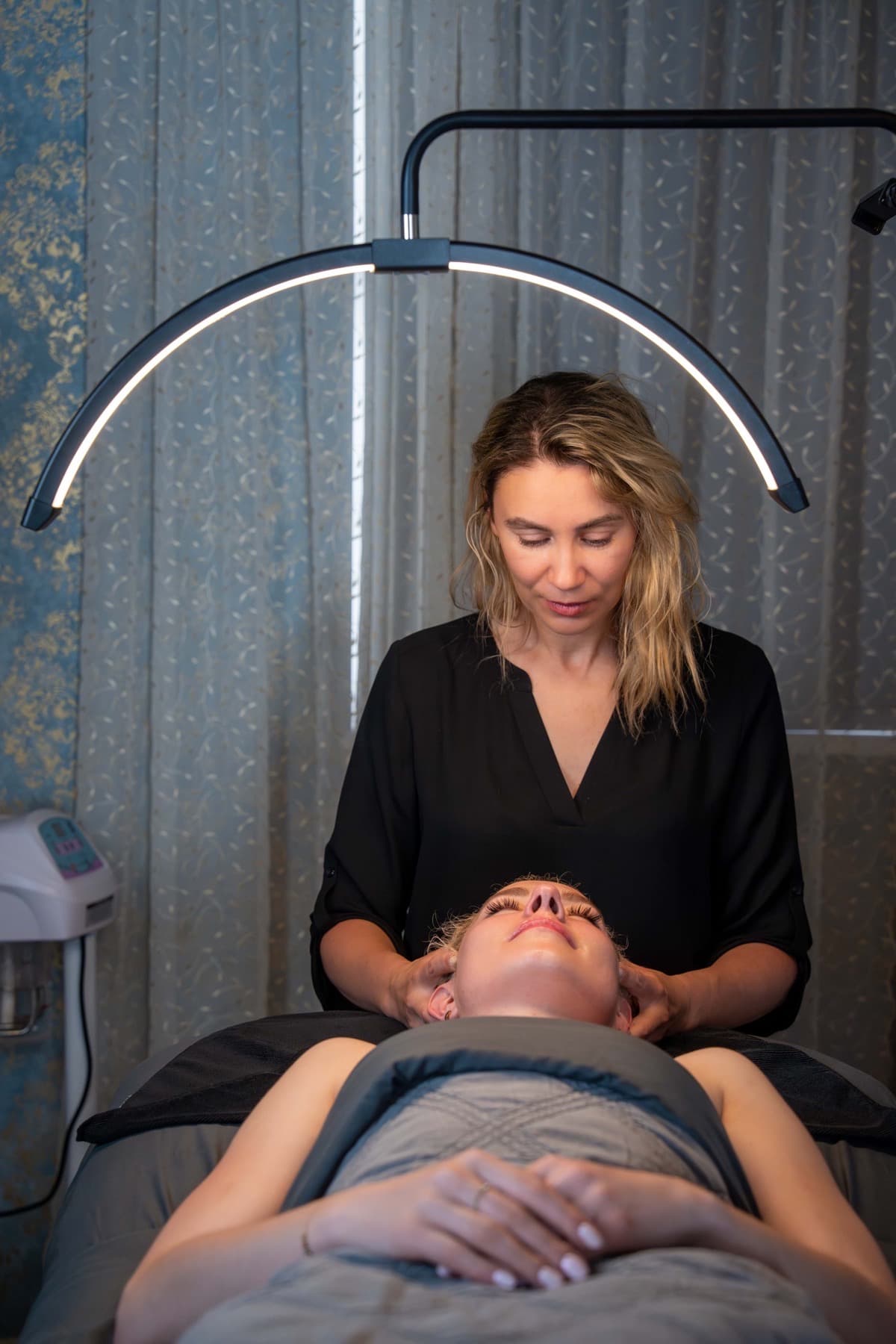 Lymphatic drainage facial massage with gua sha performed by a professional therapist at LNO Boutique in Centennial