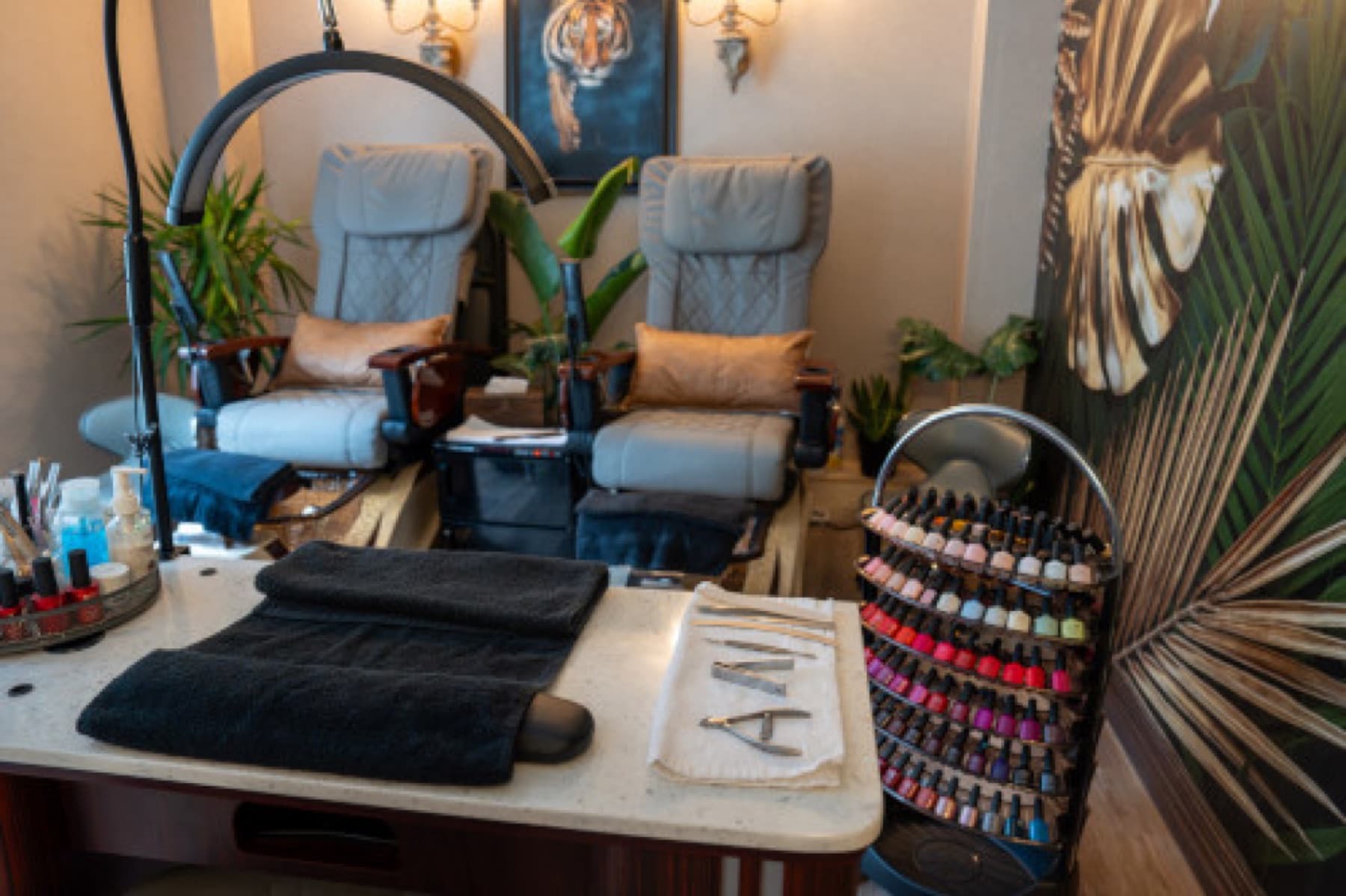 Pedicure chairs and polish wall at LNO Boutique in Centennial, Colorado
